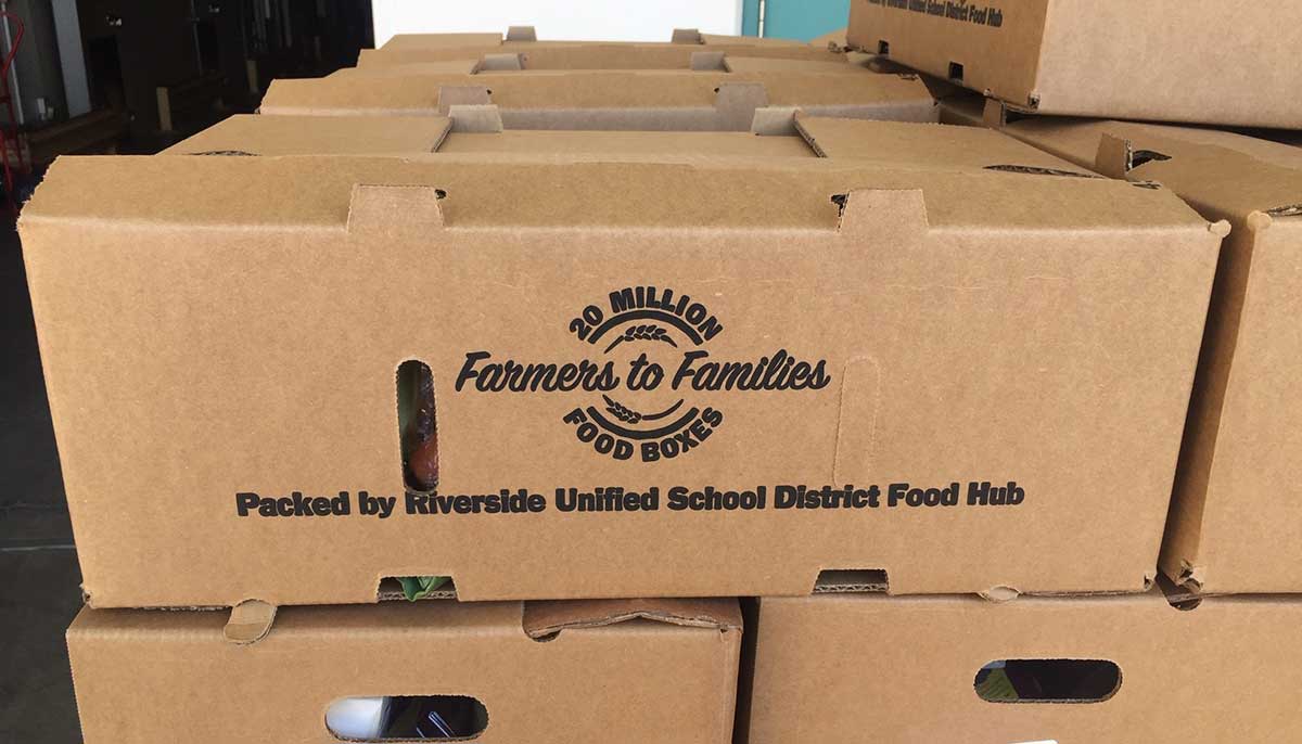 The Farm to Families Food Box Program supports farmers + school nutrition.